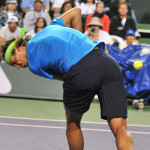 Rafael Nadal being hit by a volley
