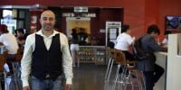 Ike Shehadeh, owner of Ike's Place on Stanford's campus near the Engineering Quad, started from humble beginnings and created one of the largest sandwich empires in the Bay Area. (KEVIN TSUKII/The Stanford Daily)