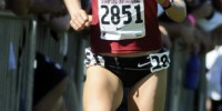 Senior Kathy Kroeger (above) won her third consecutive individual title as the men's and women's cross country teams repeated as team champions at the Stanford Invitational on Saturday. (Stanford Daily File Photo)