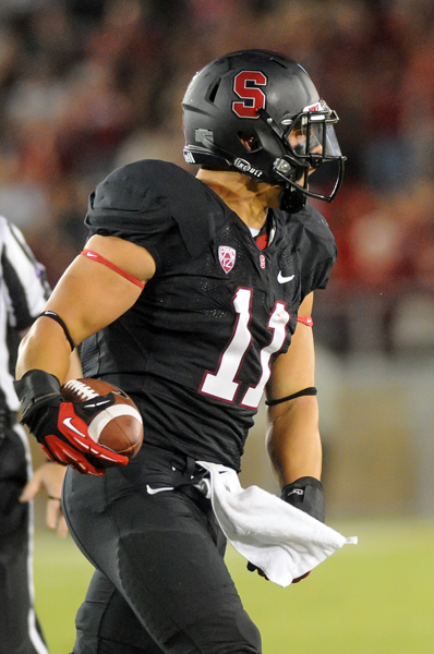 Inside linebacker Shayne Skov and the rest of the Cardinal front seven shut down UCLA quarterback Brett Hundley last Saturday. If Stanford can do the same again in tonight's Pac-12 Championship Game, chances are it will be playing in the Rose Bowl come January 1. (SIMON WARBY/The Stanford Daily)