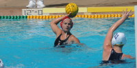 Already off to a perfect 5-0 start, the women's water polo team and sophomore star Kiley Neushal (above with ball) are aiming higher in hopes of a third consecutive national championship this year (Stanford Daily File Photo)